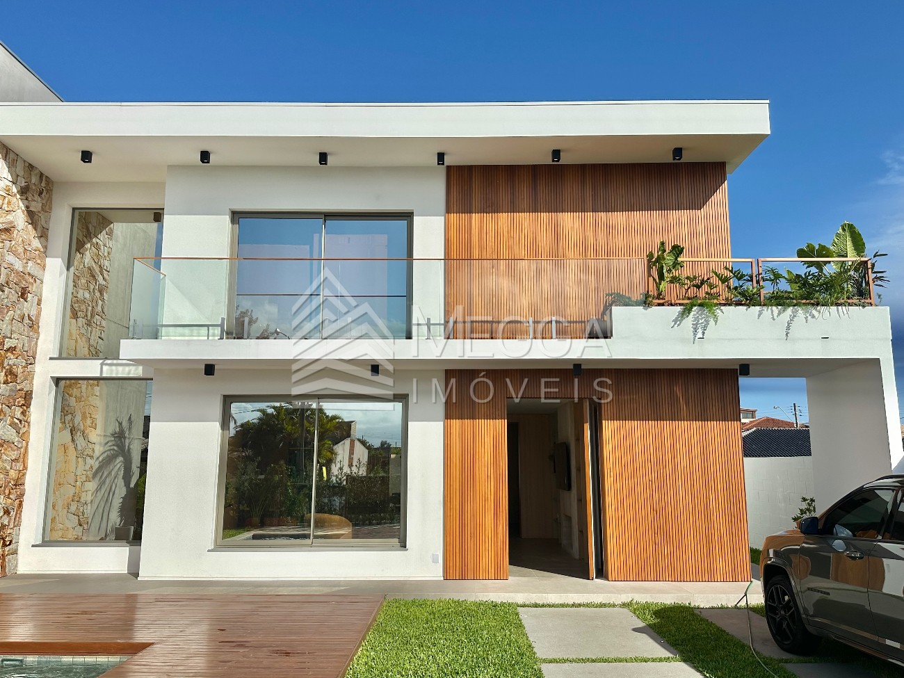 Casa 4 dormitórios para venda, Centro em Xangri-lá | Ref.: 9973